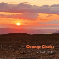 Orange Clocks – Metamorphic